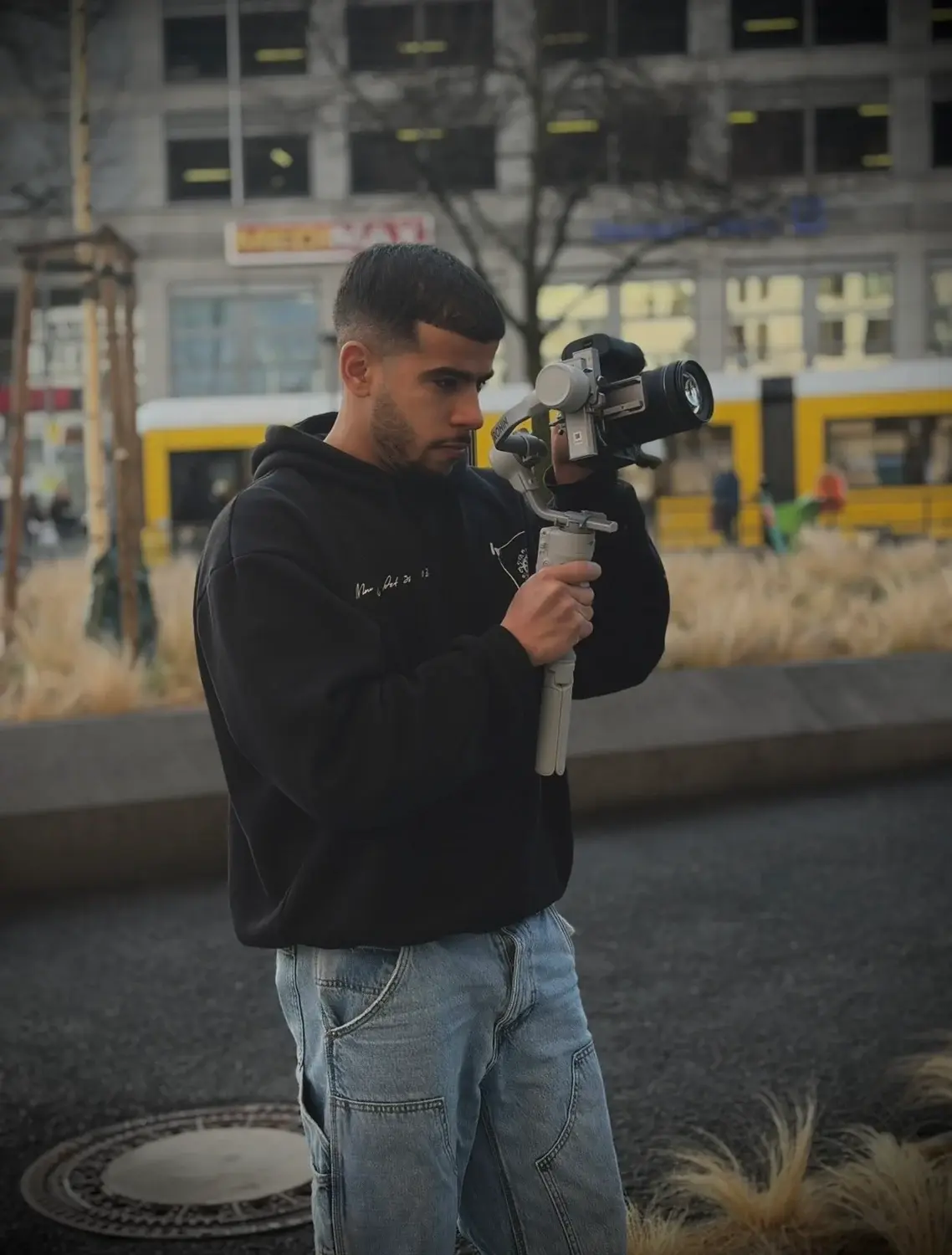 Hassan Gad holding a camera